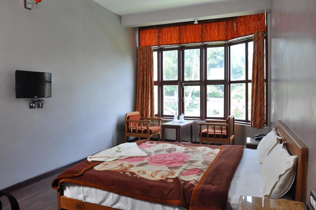 Grand Paradise Inn Kodaikanal Rum bild