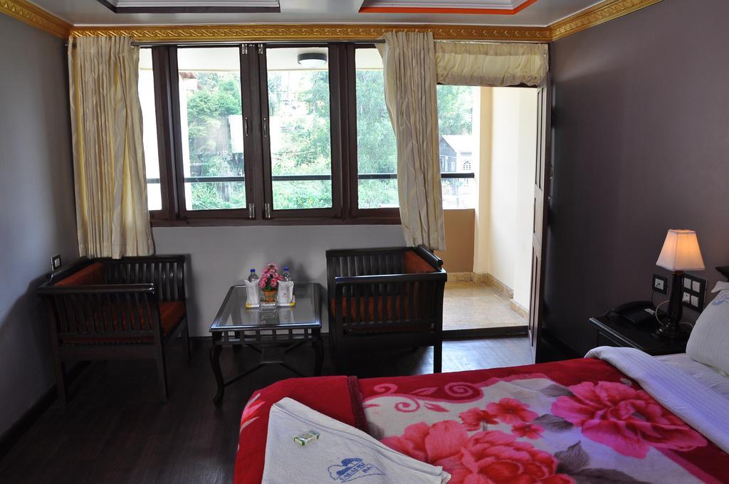Grand Paradise Inn Kodaikanal Rum bild