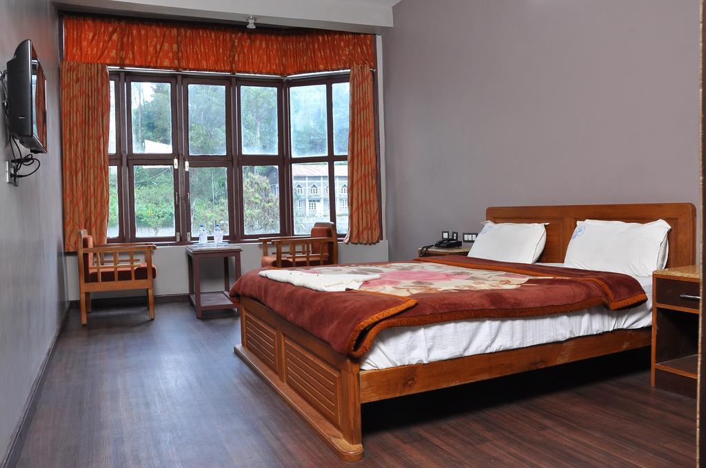 Grand Paradise Inn Kodaikanal Rum bild