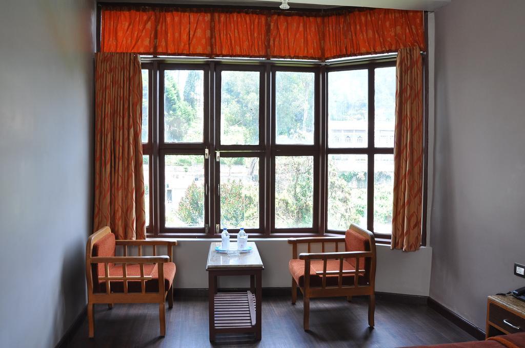 Grand Paradise Inn Kodaikanal Rum bild